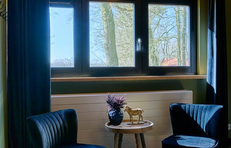 Schlafzimmer mit bequemem Bett im Ferienhaus in Glane, Twente, Overijssel.