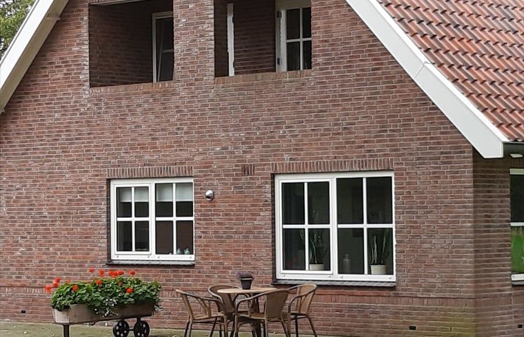 Vacation home in Lattrop Breklenkamp with charming brick facade in Twente, Overijssel.