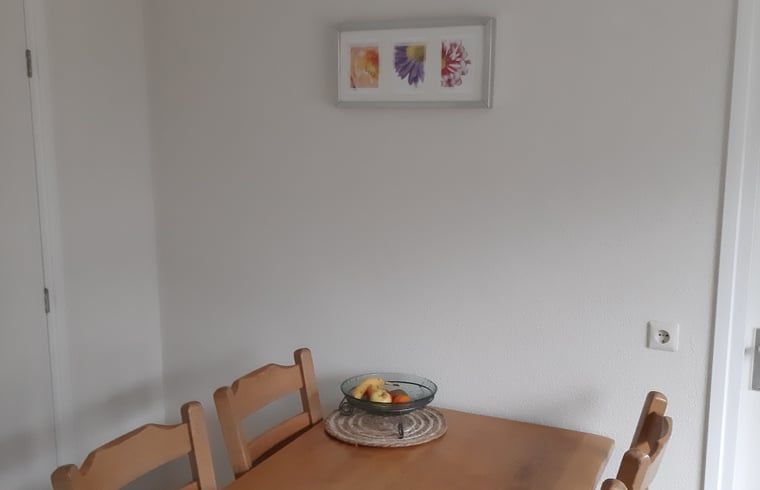 Cozy dining area in Holiday home in Lattrop Breklenkamp, perfect for family dinners in Twente, Overijssel.