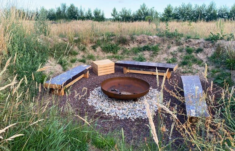 Fire pit with benches at cottage in Wijhe, Salland, Overijssel.