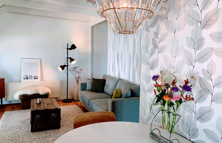 Cozy living room of Huisje in Zwolle, vacation accommodation in Overijssel.