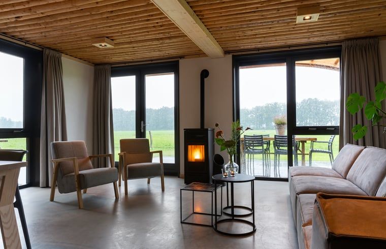 Bright living space with modern decor in Holiday home in Heeten, ideal for a vacation in Salland, Overijssel.