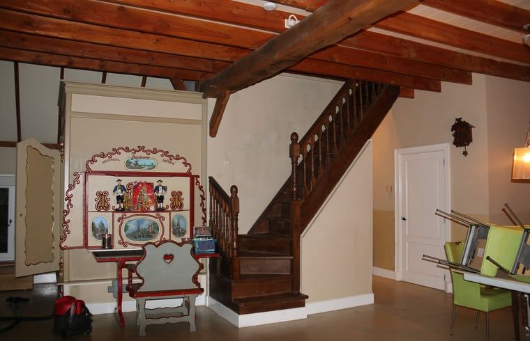 Authentic staircase in cottage in Heeten, Overijssel, with classic wooden finish.