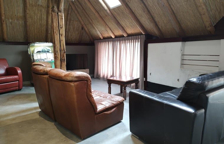 Cozy sitting area with jukebox in Holiday home in Nieuwleusen, Salland, Overijssel.