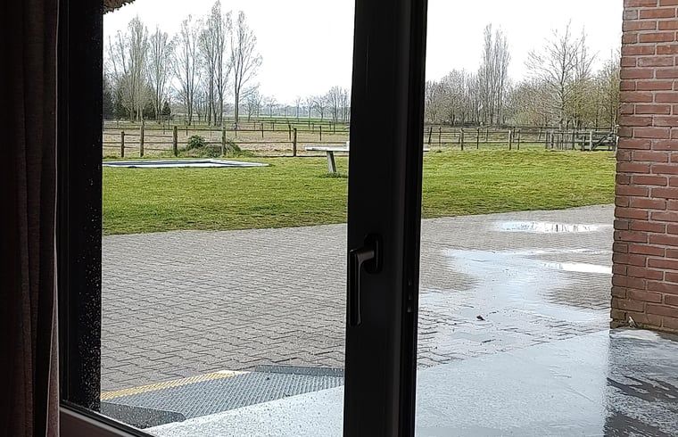 View of green meadows from Holiday Home in Nieuwleusen, Salland, Overijssel.