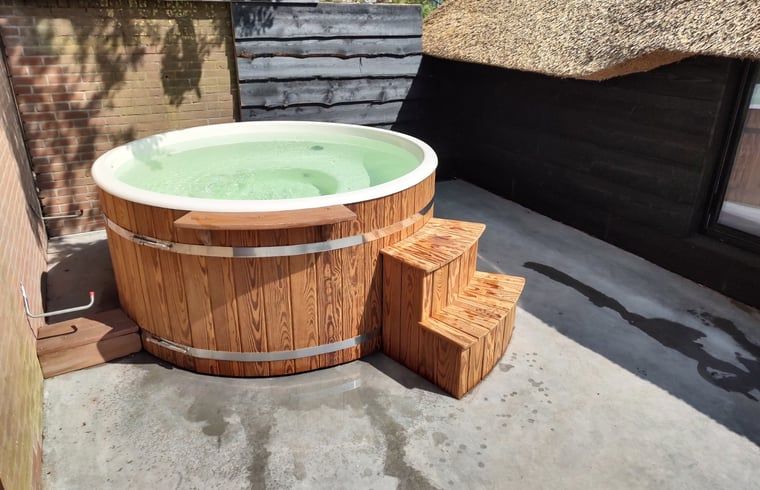 Wooden hot tub on terrace of Holiday home in Nieuwleusen, Salland, Overijssel.