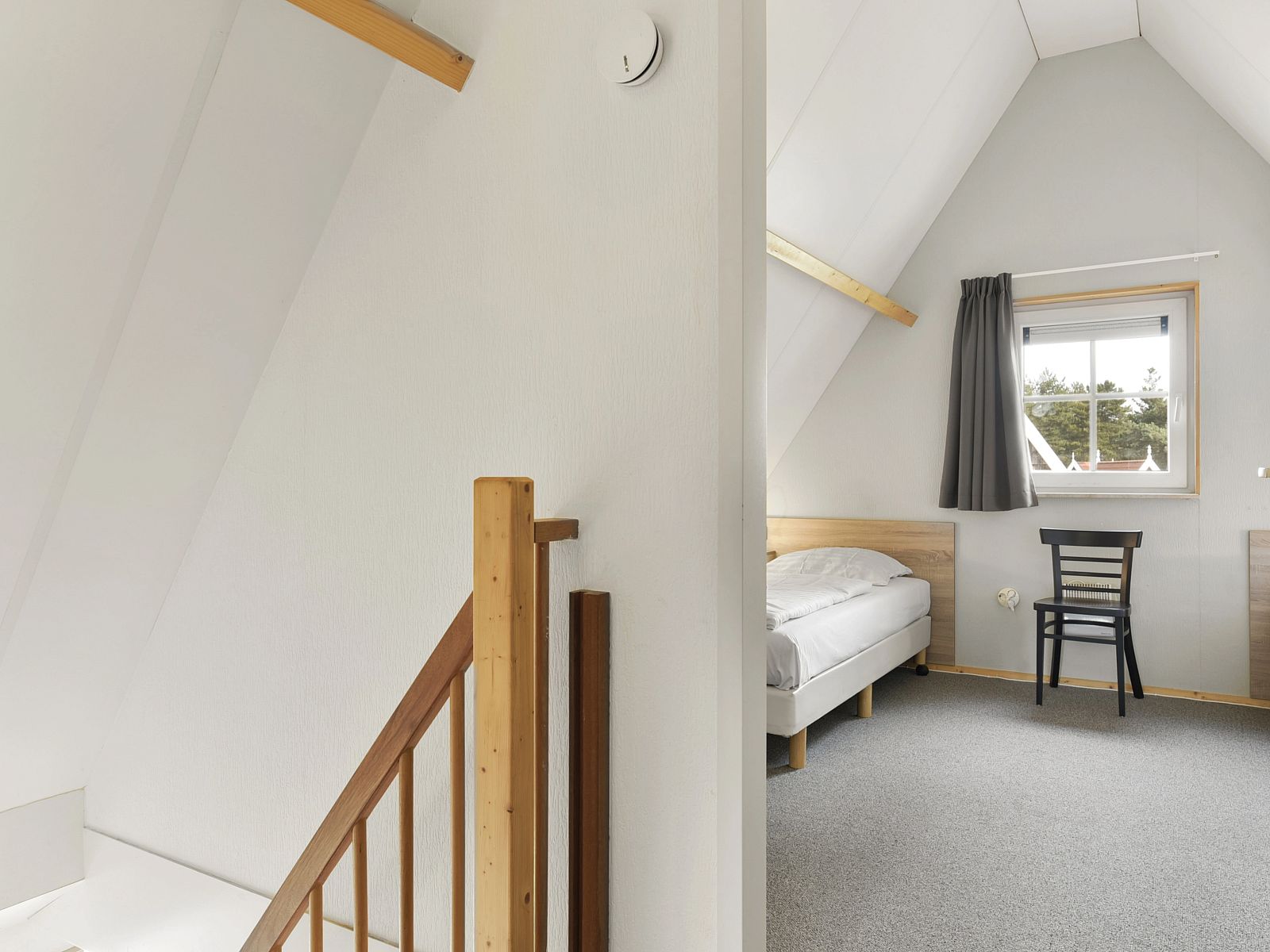 Stylish bedroom with storage in Landgoed De Hellendoornse Berg, Haarle, Overijssel.