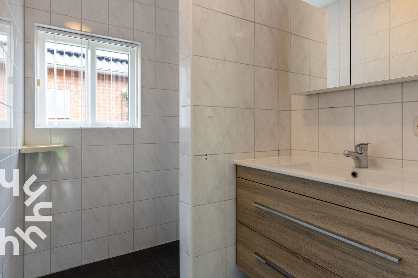 Gezellige patio van vakantiehuis OV218 in Haarle, Hellendoorn, omgeven door natuur in Salland, Overijssel.