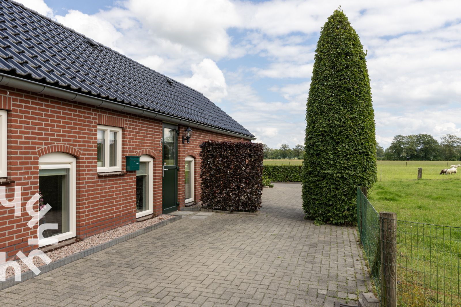Vakantiehuis OV218 in Haarle, Hellendoorn, omgeven door groene velden in het mooie Salland, Overijssel.