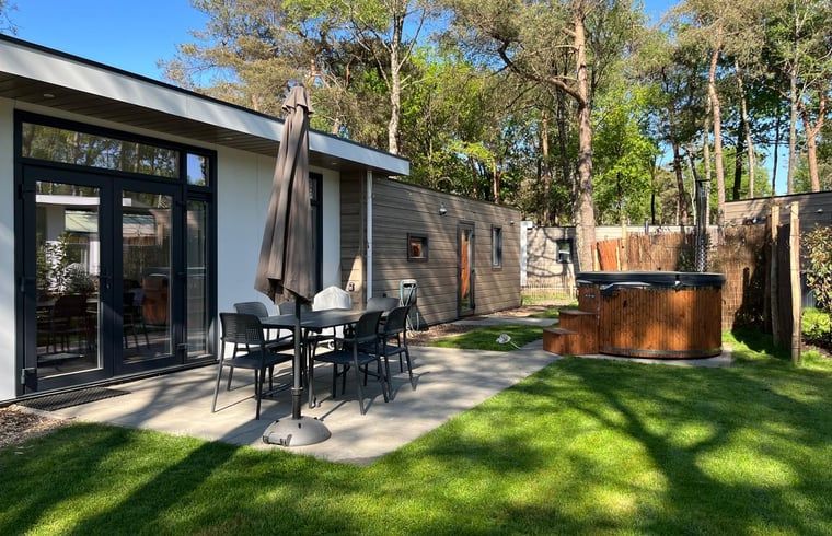 Enjoy the terrace at Holiday Home in Haarle, located in the nature of Hellendoorn, Overijssel.