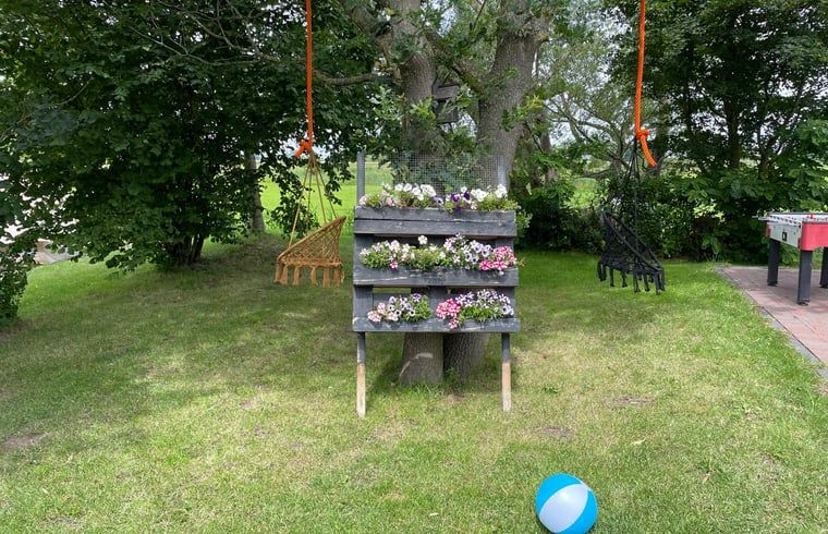 Play area with swing at Cottage in Hasselt, ideal vacation home for families in Salland, Overijssel.