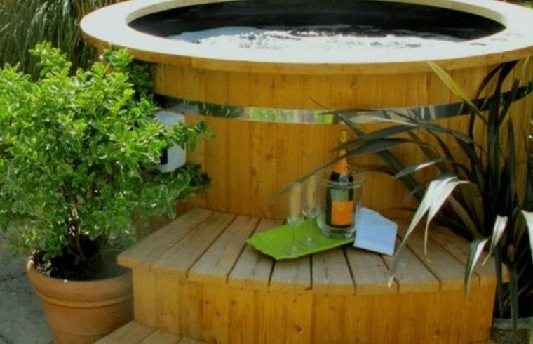 Hot tub with champagne at Holiday home in Ommen, Vechtstreek, Overijssel.