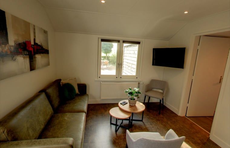 Gemuetliches Wohnzimmer im Ferienhaus in Ommen, Overijssel.