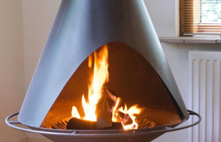 Gezellige woonkamer van Vakantiehuis in Dalfsen, met uitzicht op de natuur in Overijssel.