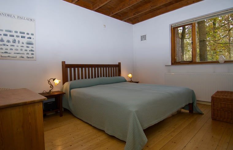 Hoofdslaapkamer van Vakantiehuis in Dalfsen, rust en comfort in de Vechtstreek, Overijssel.