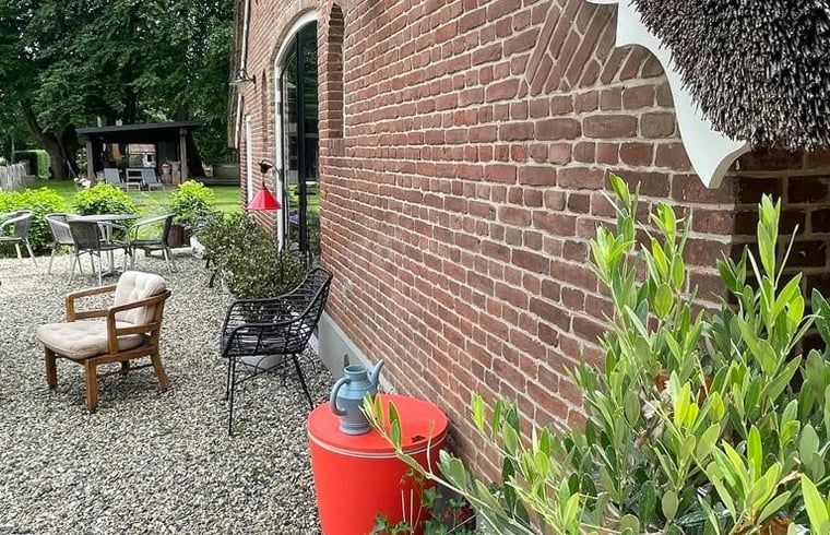 Gemuetliche Sitzecke im Freien im Cottage in Dalfsen, Ferienunterkunft in Overijssel.