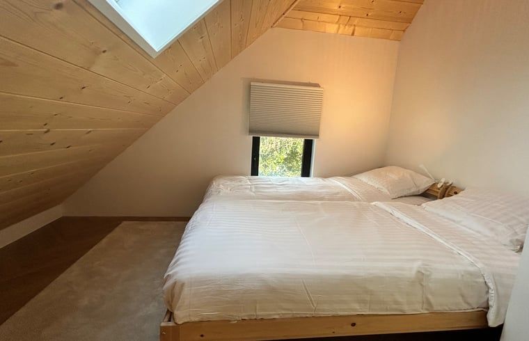 Gezellige slaapkamer in Huisje in Balkbrug met houten plafond