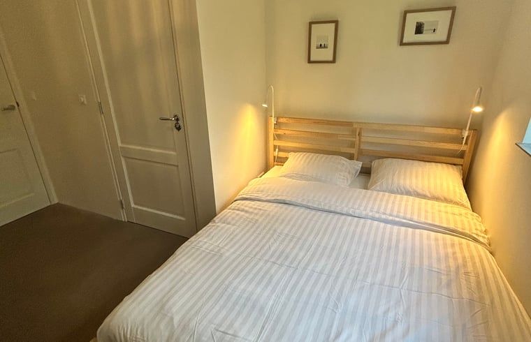 Knusse slaapkamer in Huisje in Balkbrug vakantiehuis