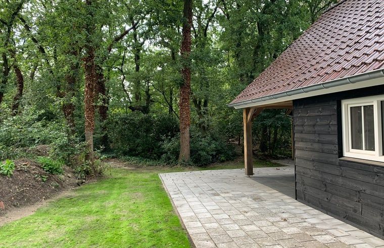 Terrace of cottage in Marienberg surrounded by nature in the Vecht region, Overijssel.