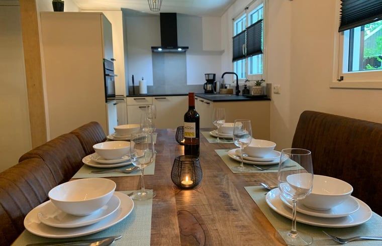 Stylish dining room in Holiday cottage in Marienberg, Vechtstreek, Overijssel, with modern kitchen.