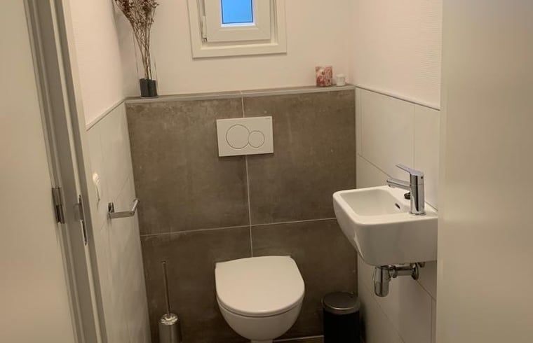 Compact bathroom in cottage in Marienberg, Vecht region, Overijssel, with modern plumbing.