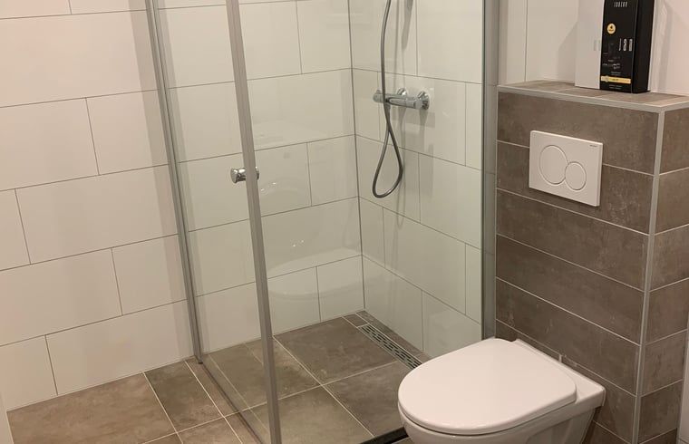 Stylish shower in Holiday Home in Marienberg, Vechtstreek, Overijssel, with modern amenities.
