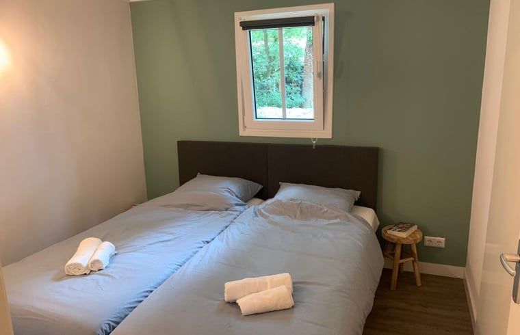 Bedroom with double bed in Holiday Home in Marienberg, Vechtstreek, Overijssel.