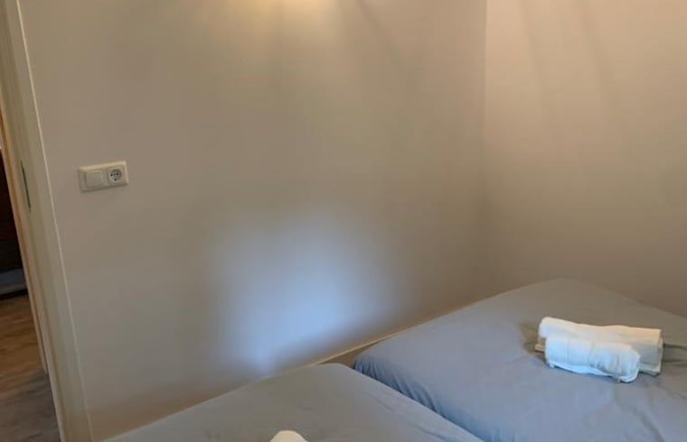 Cozy bedroom in Holiday cottage in Marienberg, Vechtstreek, Overijssel, with comfortable beds.