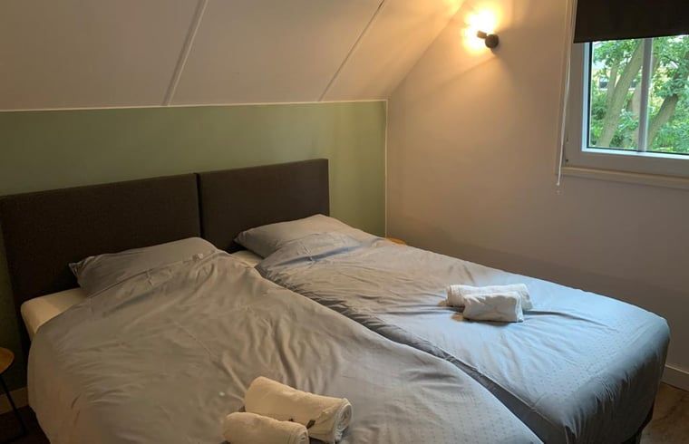 Bedroom with view of nature in Cottage in Marienberg, Vechtstreek, Overijssel.