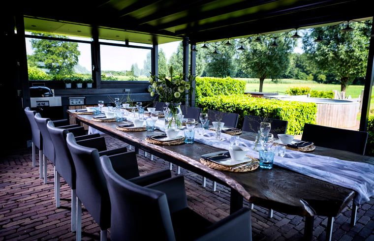 Outdoor dining at Holiday Home in Hoonhorst, atmospheric setting in the Vecht region, Overijssel.