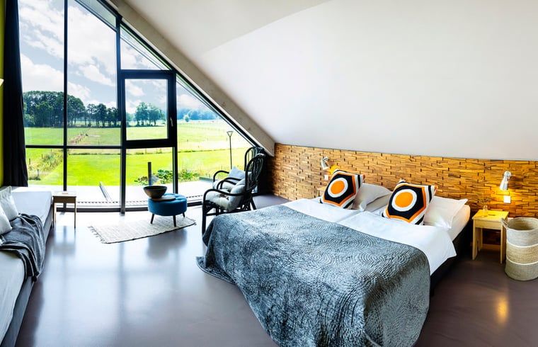 Spacious bedroom in Holiday home in Hoonhorst overlooking nature, Vecht region, Overijssel.