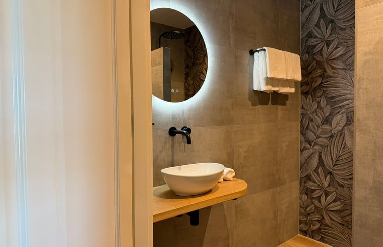 Modern bathroom with illuminated mirror in Holiday cottage in Kloosterhaar, Vechtstreek, Overijssel.