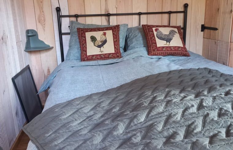 Gezellig ingerichte slaapkamer van vakantiehuis in Brucht, Vechtstreek, Overijssel.