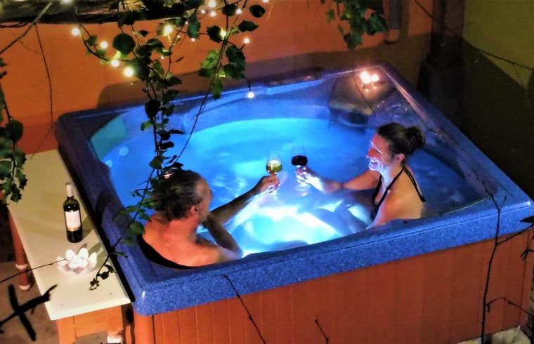 Enjoy a relaxing evening in the Jacuzzi at Huisje in Giethoorn, a cozy vacation home in Northwest Overijssel, Overijssel.