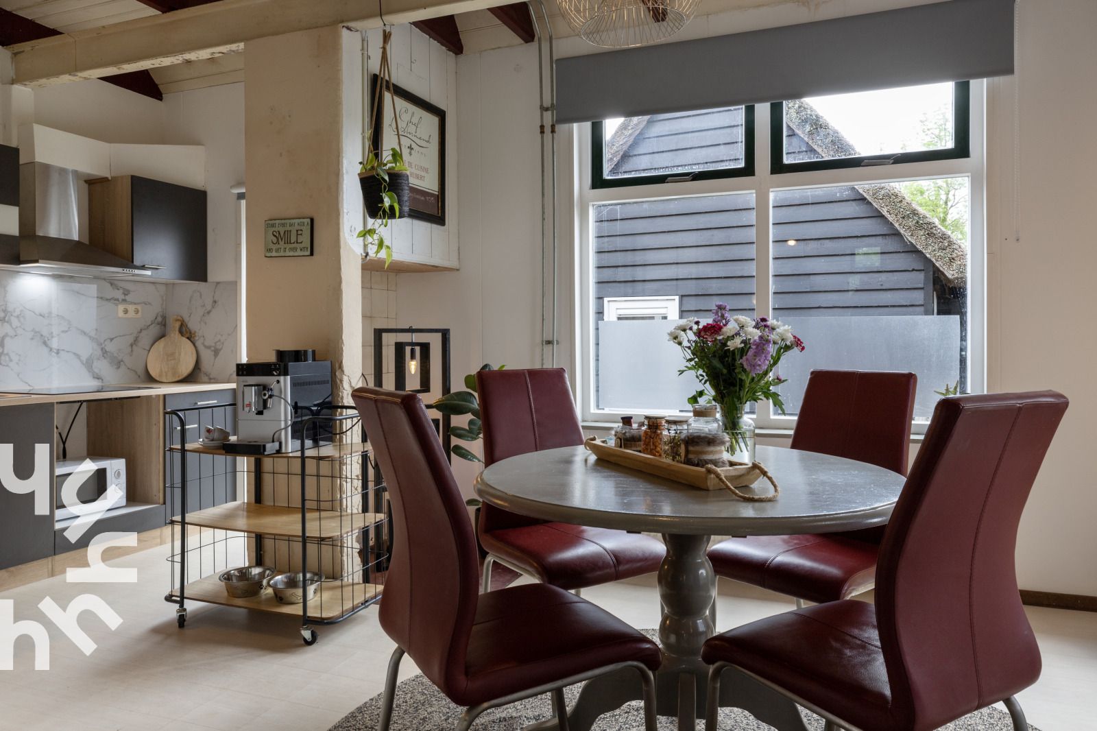 Attractive bedroom in vacation home OV480 in Giethoorn, Overijssel, with comfortable bed and view of green nature.