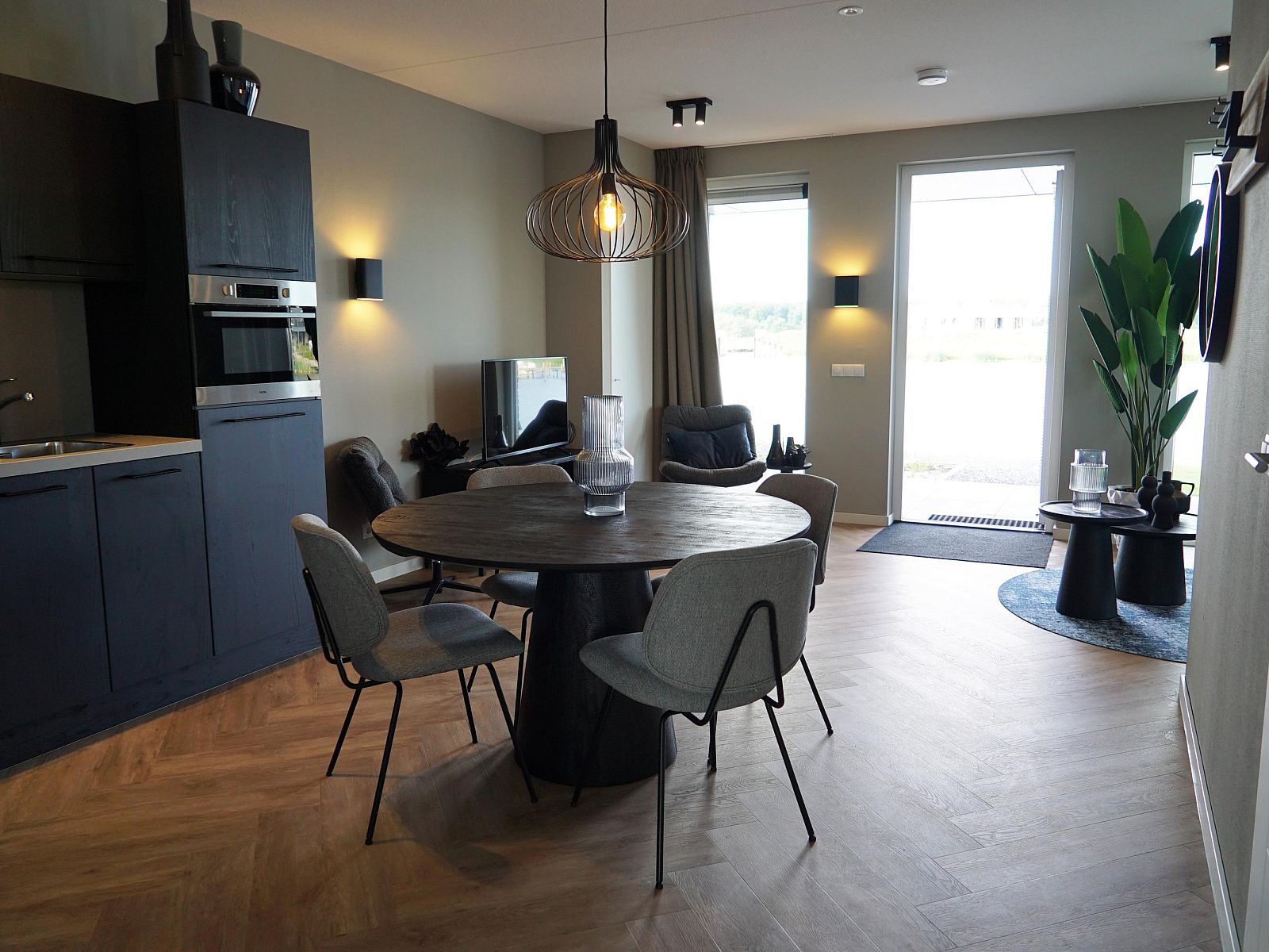 Stylish interior of Apartment in Kampen, Northwest Overijssel, with modern kitchen and sitting area for a comfortable stay.
