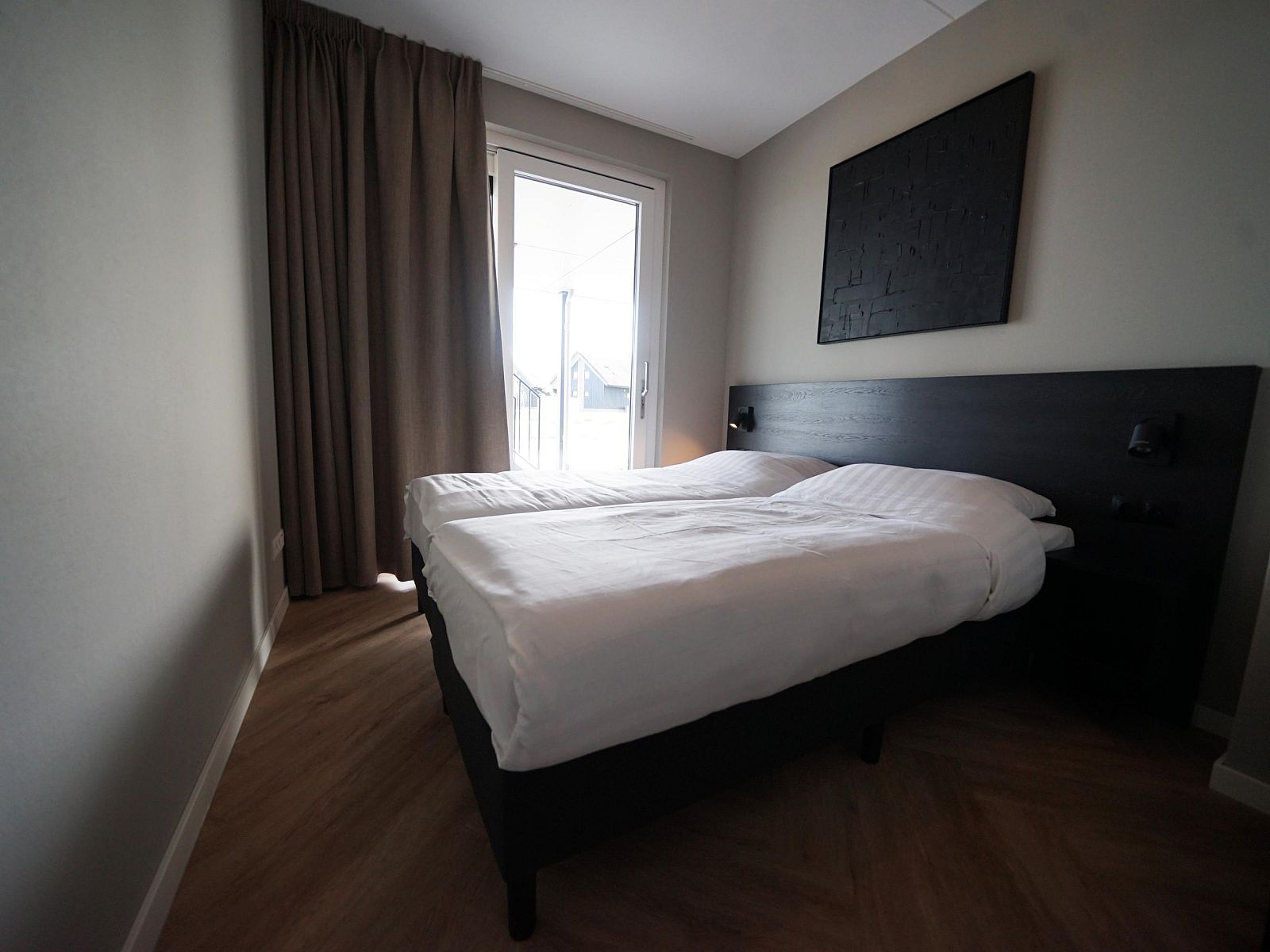 Cozy bedroom in Apartment in Kampen, Northwest Overijssel, with comfortable double bed and modern furnishings.