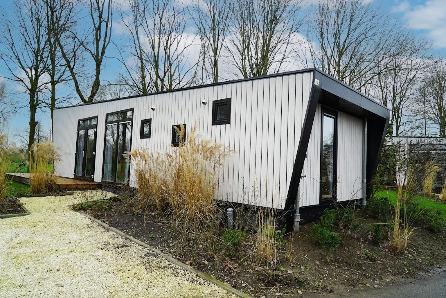 Detached house in IJhorst, Northwest Overijssel, offers a modern vacation home with a beautiful terrace surrounded by nature.