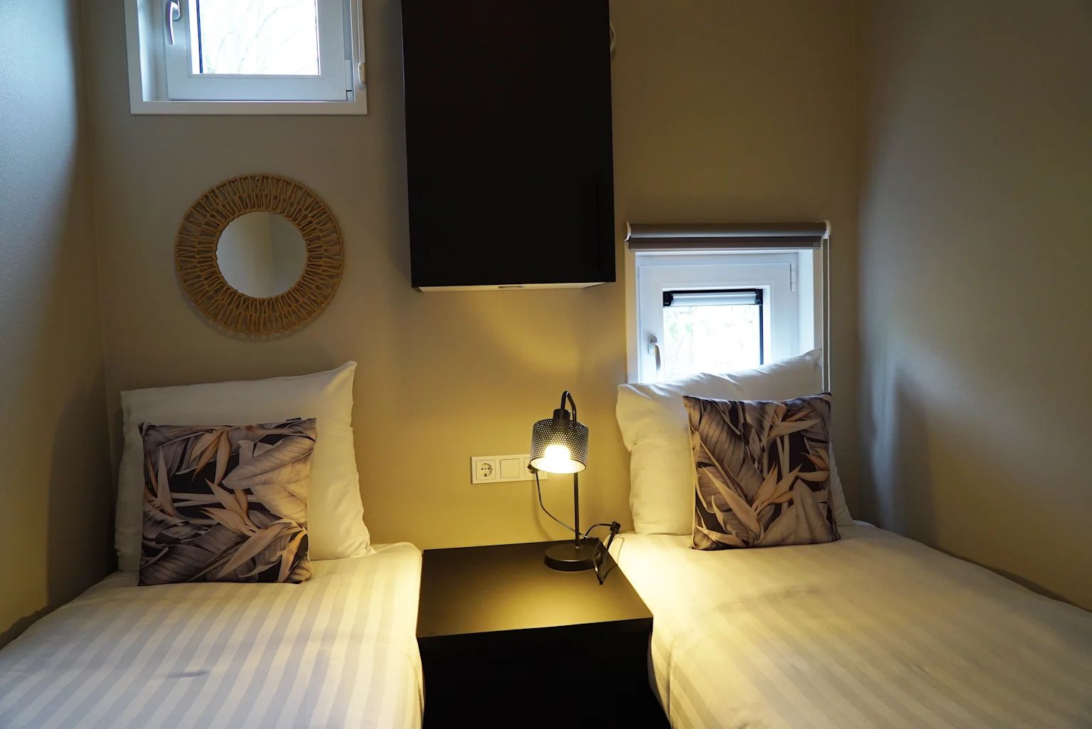 Cozy bedroom in detached house in IJhorst, Overijssel, with comfortable beds and mood lighting.