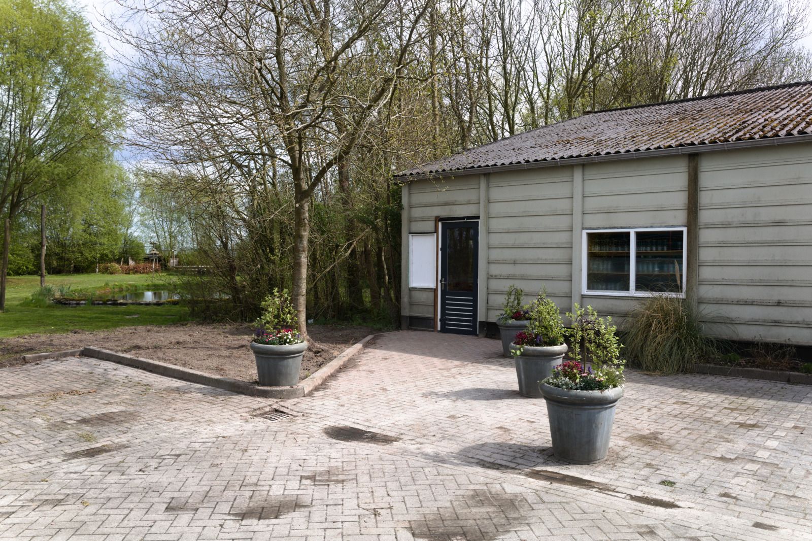 Children play in adventure playground at OV669 vacation home in Blokzijl, Overijssel.