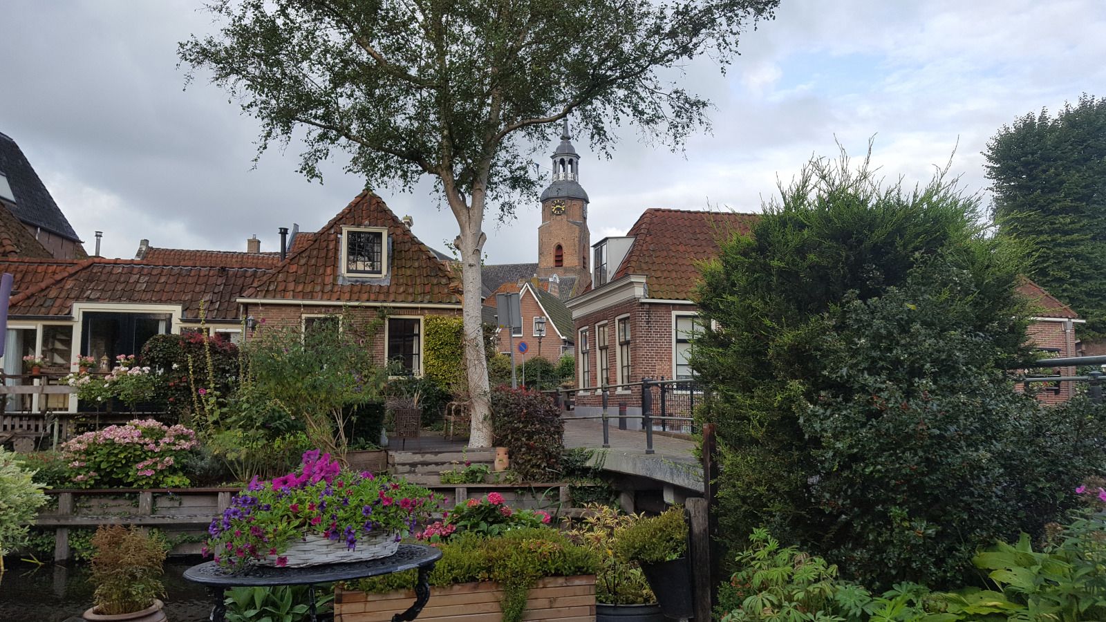 Modern bathroom in OV684 vacation home, Blokzijl, with wooden accents and luxury amenities, Northwest Overijssel.