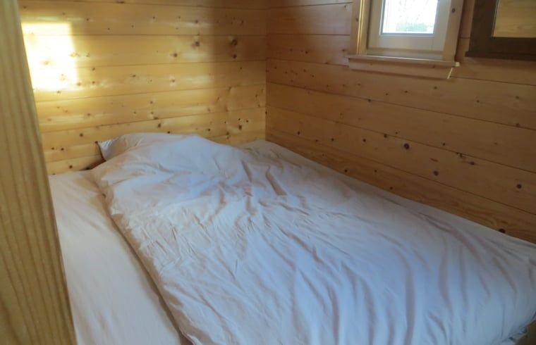 Knusse slaapkamer in Huisje in IJsselmuiden, perfect voor een rustige nacht in Overijssel.