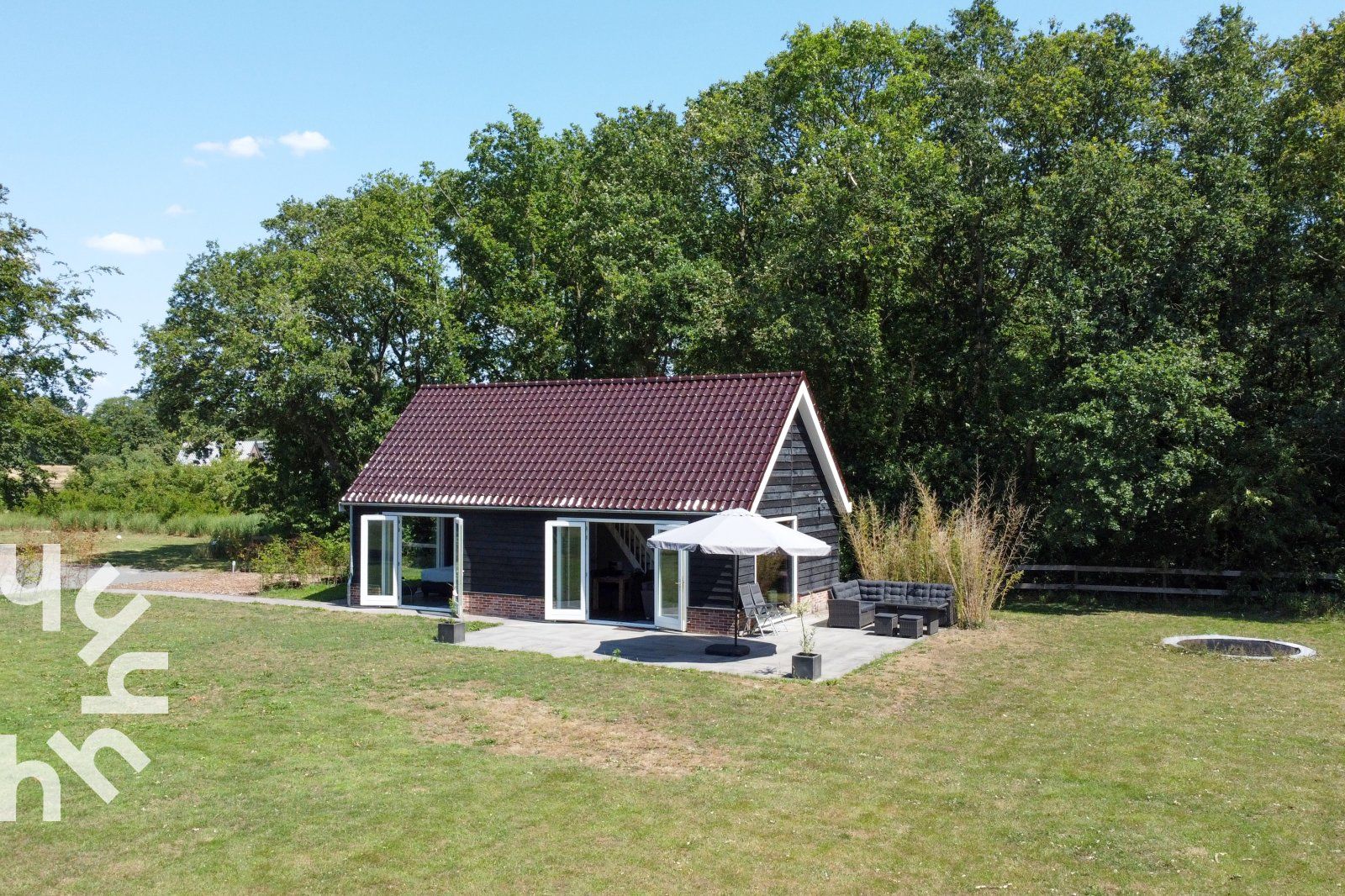 Vacation home OV473 in Baars, Northwest Overijssel, offers a serene setting with a spacious terrace and beautiful views of the surrounding nature.