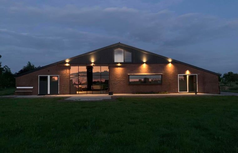 Vacation home in Zalk at dusk, located in the quiet northwestern province of Overijssel, Overijssel.