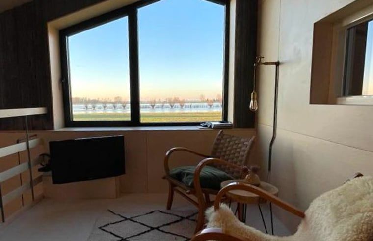 Cozy sitting area with view in Holiday home in Zalk, perfect for relaxation in Northwest Overijssel.
