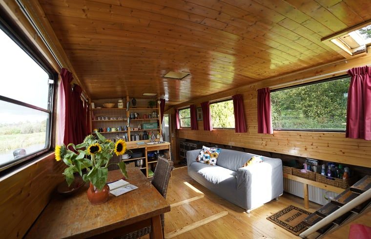 Cozy living room in House in Vinkeveen, vacation home in Utrecht north, Utrecht with lots of natural light.