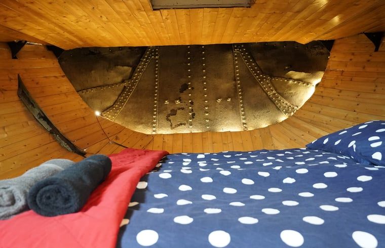 Unique bedroom in House in Vinkeveen, vacation home in Utrecht north, Utrecht with wooden details.