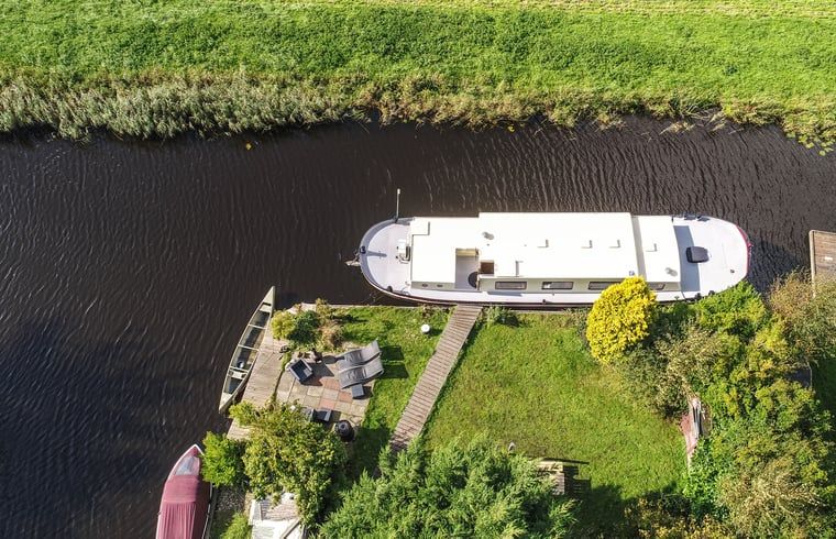 Aerial view of House in Vinkeveen, waterfront vacation home in Utrecht north, Utrecht with green surroundings.