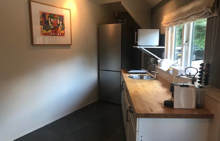 Compacte en functionele keuken van Huisje in Tienhoven, vakantieaccommodatie in Tienhoven, Utrecht.