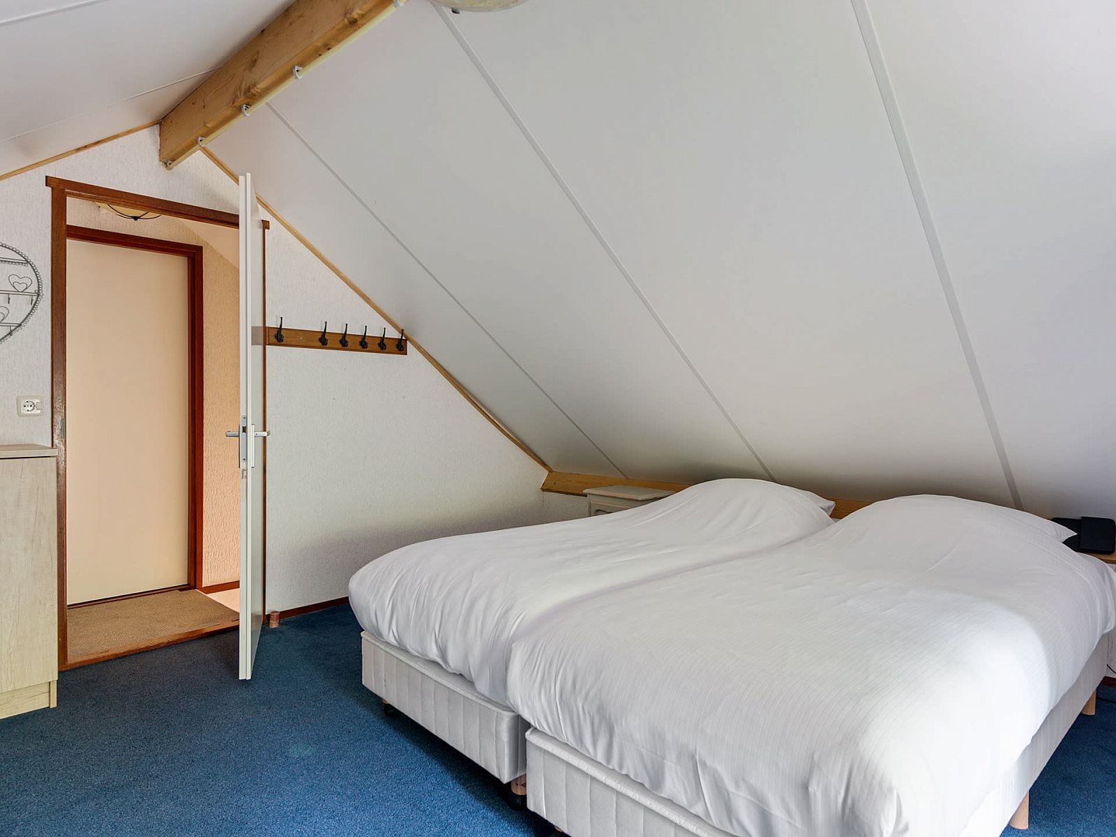 Gezellige slaapkamer in Vakantiewoning Drieburg, Doorn, Utrechtse Heuvelrug. Comfortabel vakantiehuis met knusse slaapruimte.